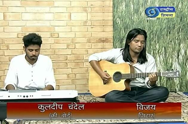 students accompanying with group song performed at DD Shimla